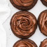 Overhead view of gluten-free Crumbl chocolate cake cookies with chocolate frosting