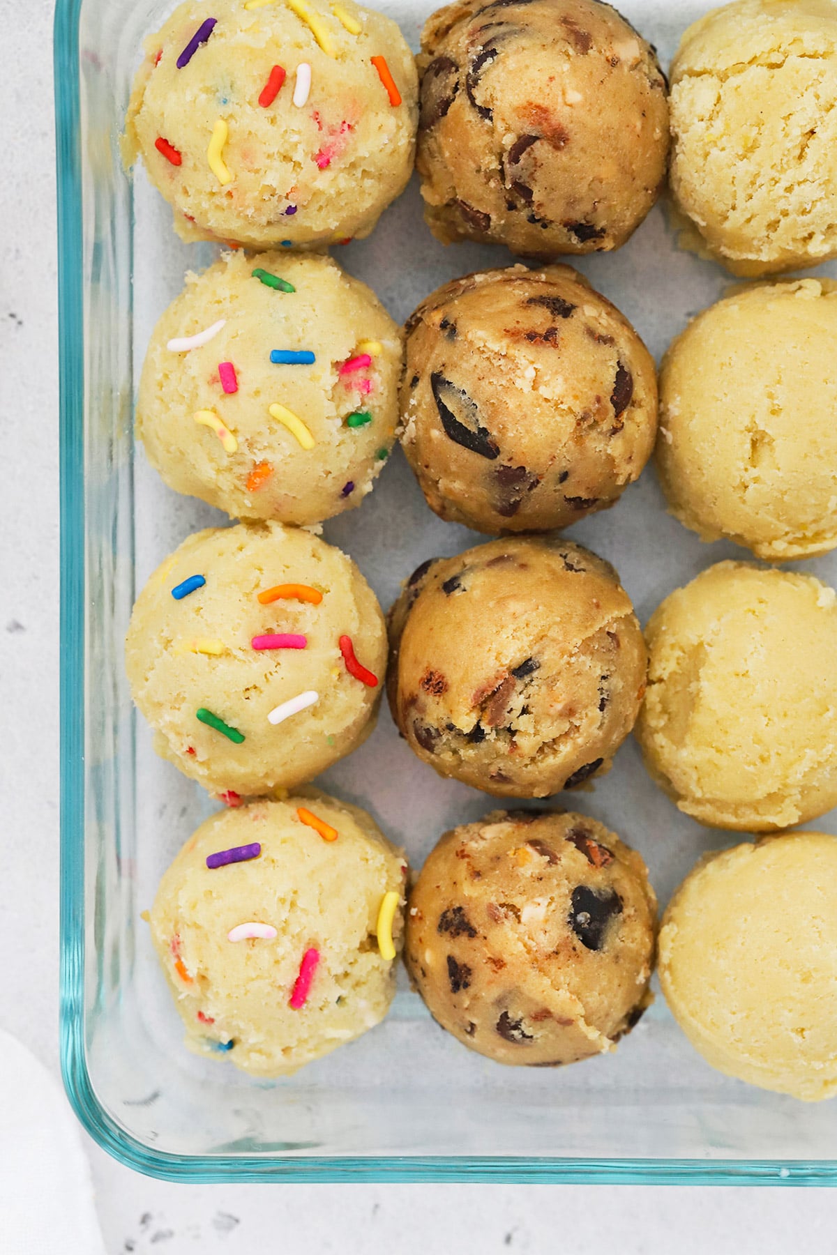 Overhead view of three kinds of frozen cookie dough