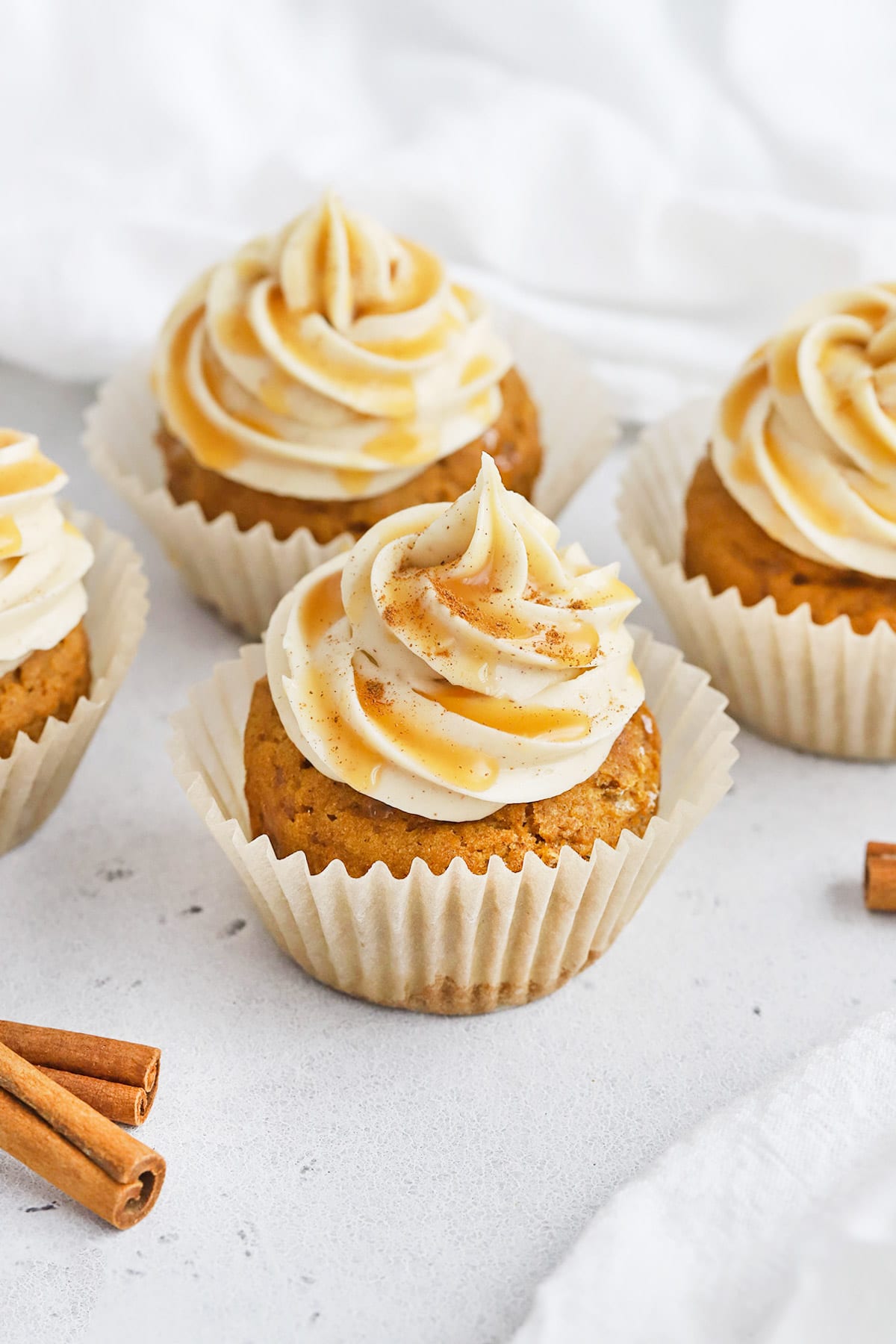 Gluten-Free Pumpkin Cupcakes with Cinnamon Cream Cheese Frosting and Caramel