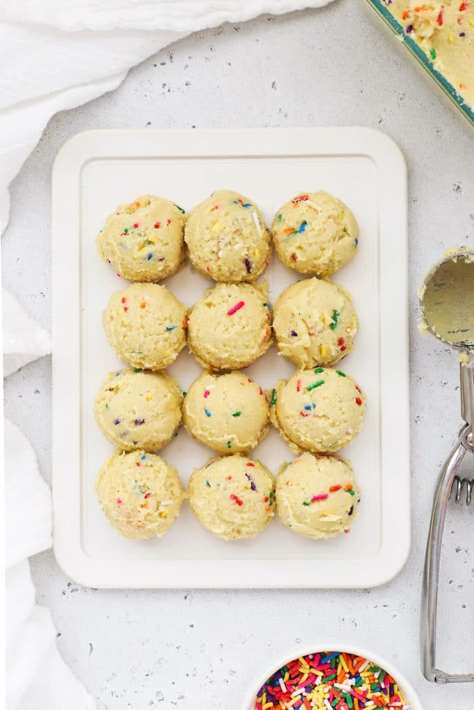 Gluten-free sprinkle sugar cookie dough scooped into balls