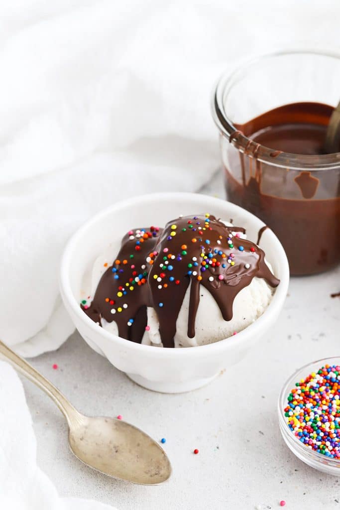 Homemade magic chocolate shell hardening on vanilla ice cream