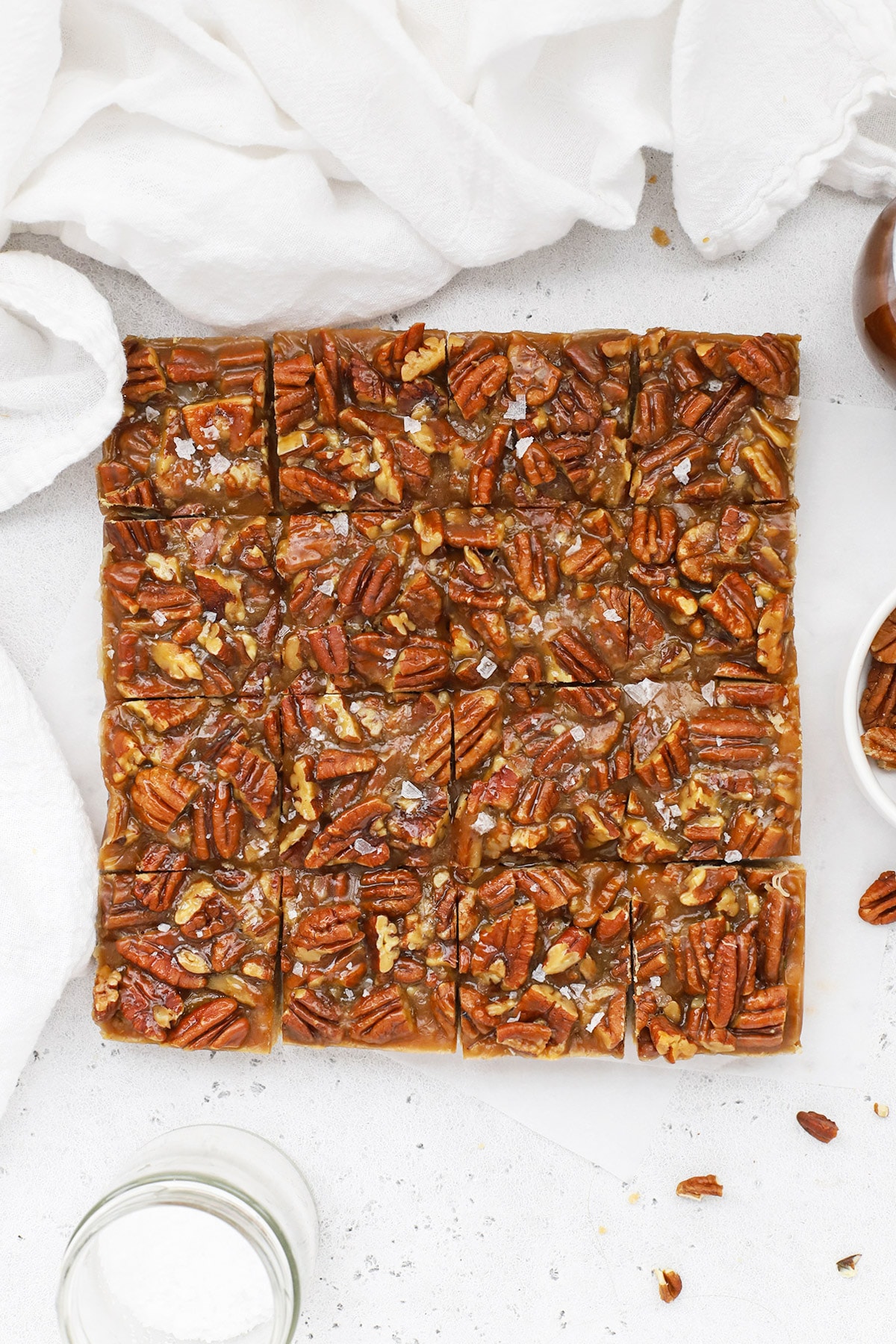Overhead view of gluten-free salted caramel pecan bars cut into squares