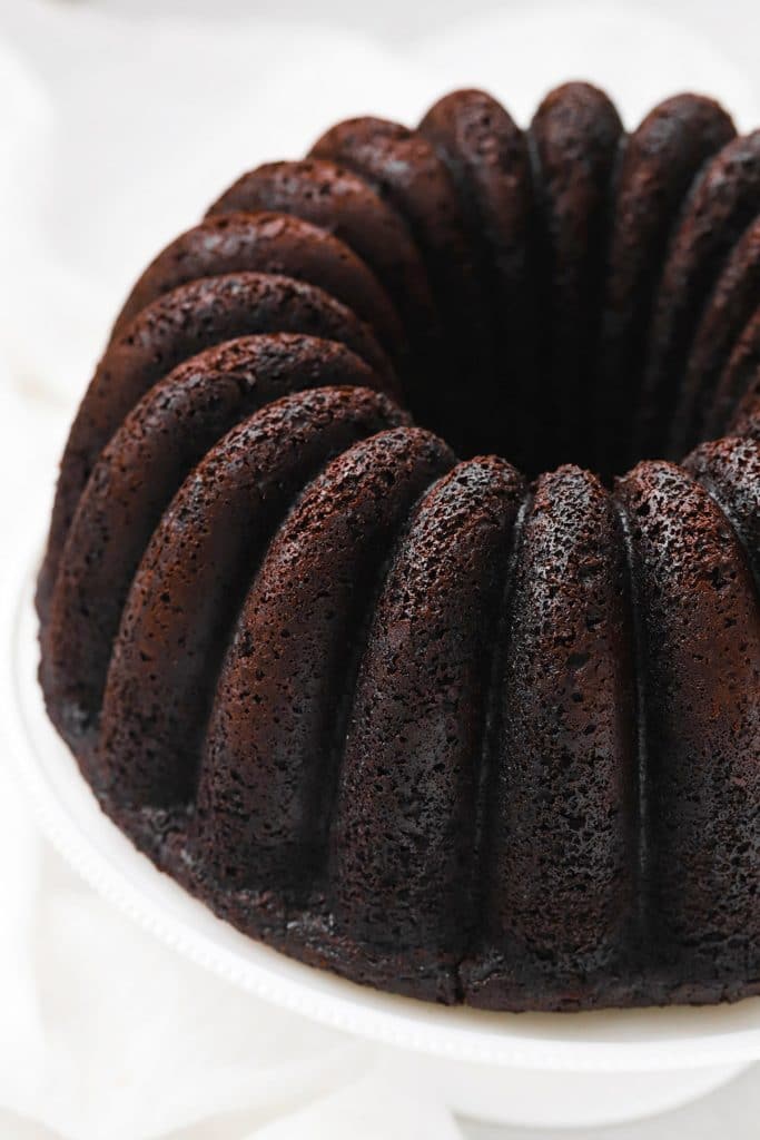 Front view of gluten-free chocolate bundt cake that came cleanly out of the bundt pan