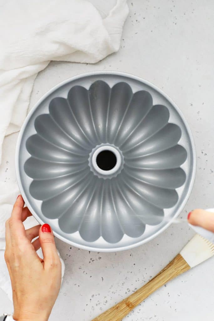 Overhead view of how to grease a bundt pan