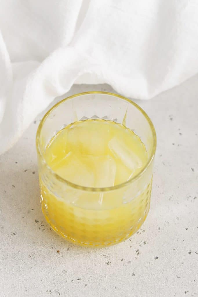 Adding Fresh Juices & Ginger Mint Syrup to orange mocktails