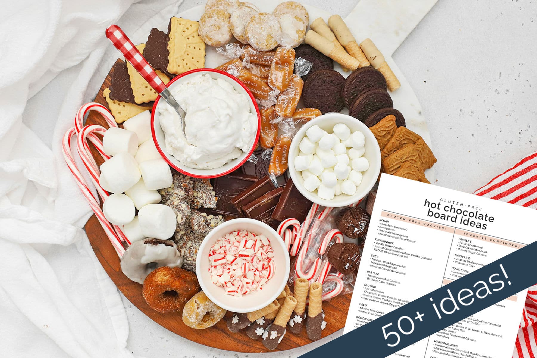 Overhead view of a gluten-free hot chocolate charcuterie board with toppings and mix-ins