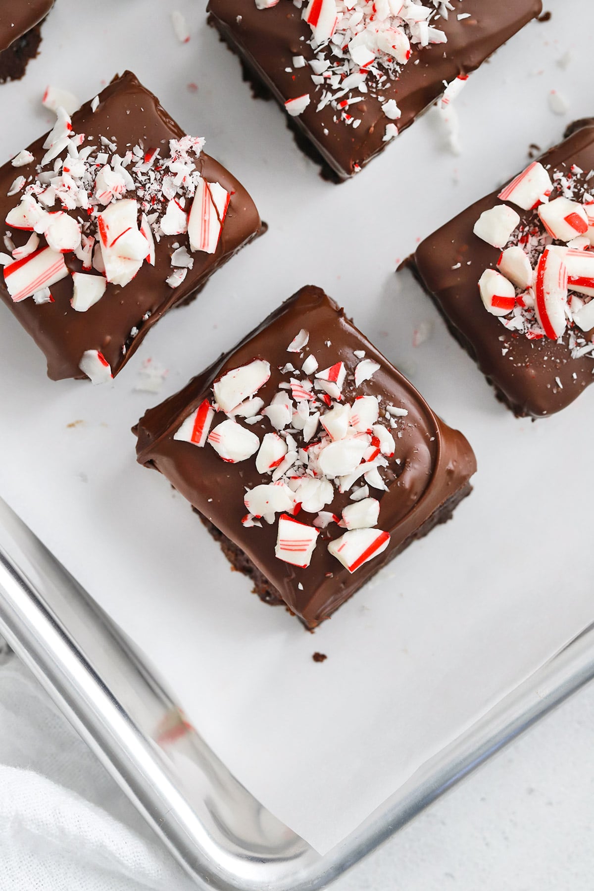 Overhead view of gluten-free peppermint brownie bites topped with crushed candy canes