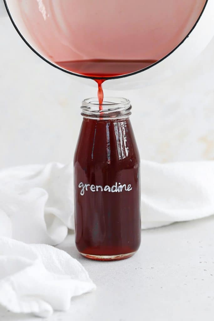 Front view of homemade grenadine syrup for mocktails