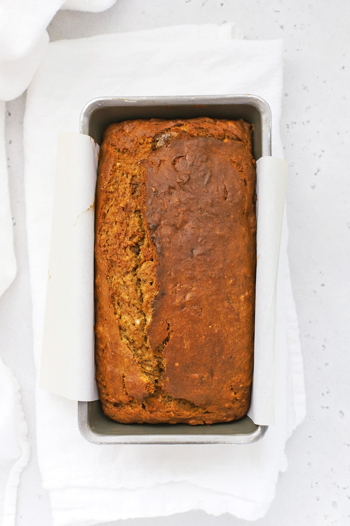 Overhead view of a loaf of gluten free brown butter banana bread