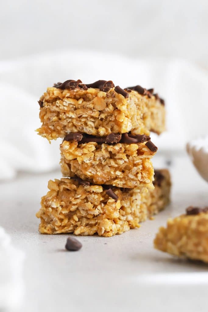 Front view of healthy peanut butter granola bars drizzled with chocolate
