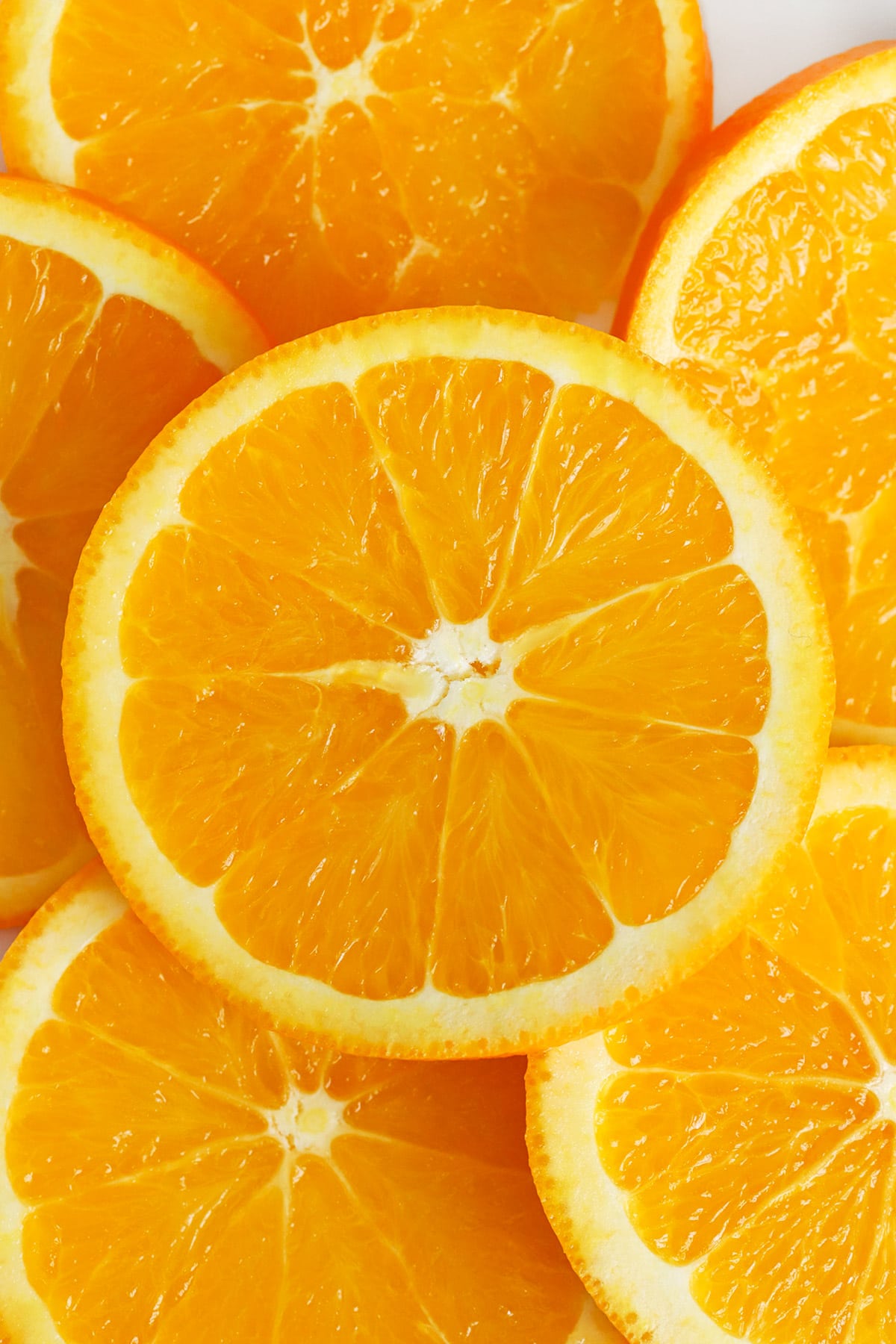 Fresh orange slices to garnish virgin sunrise mocktails