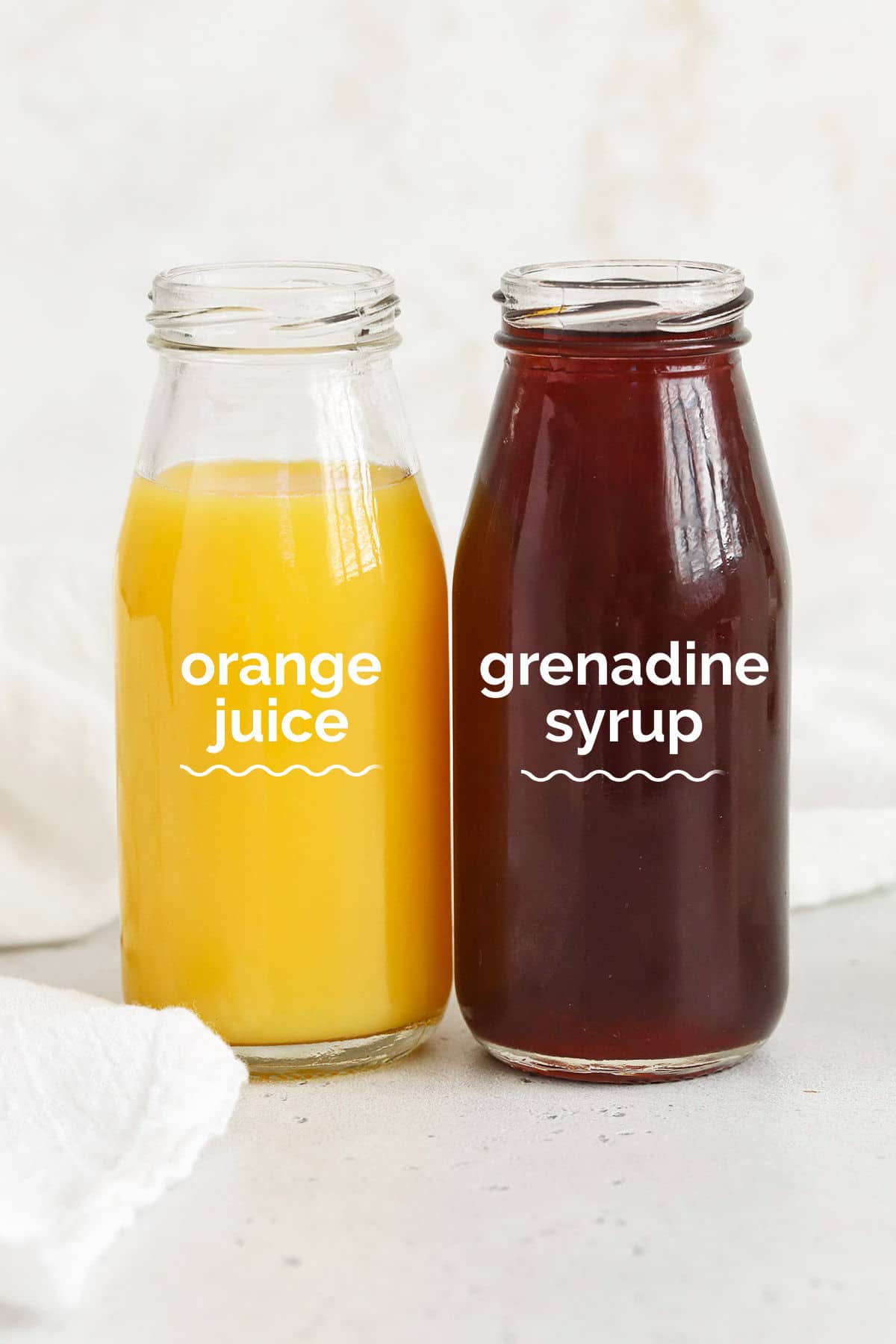 Orange juice and grenadine to make sweet sunrise mocktails