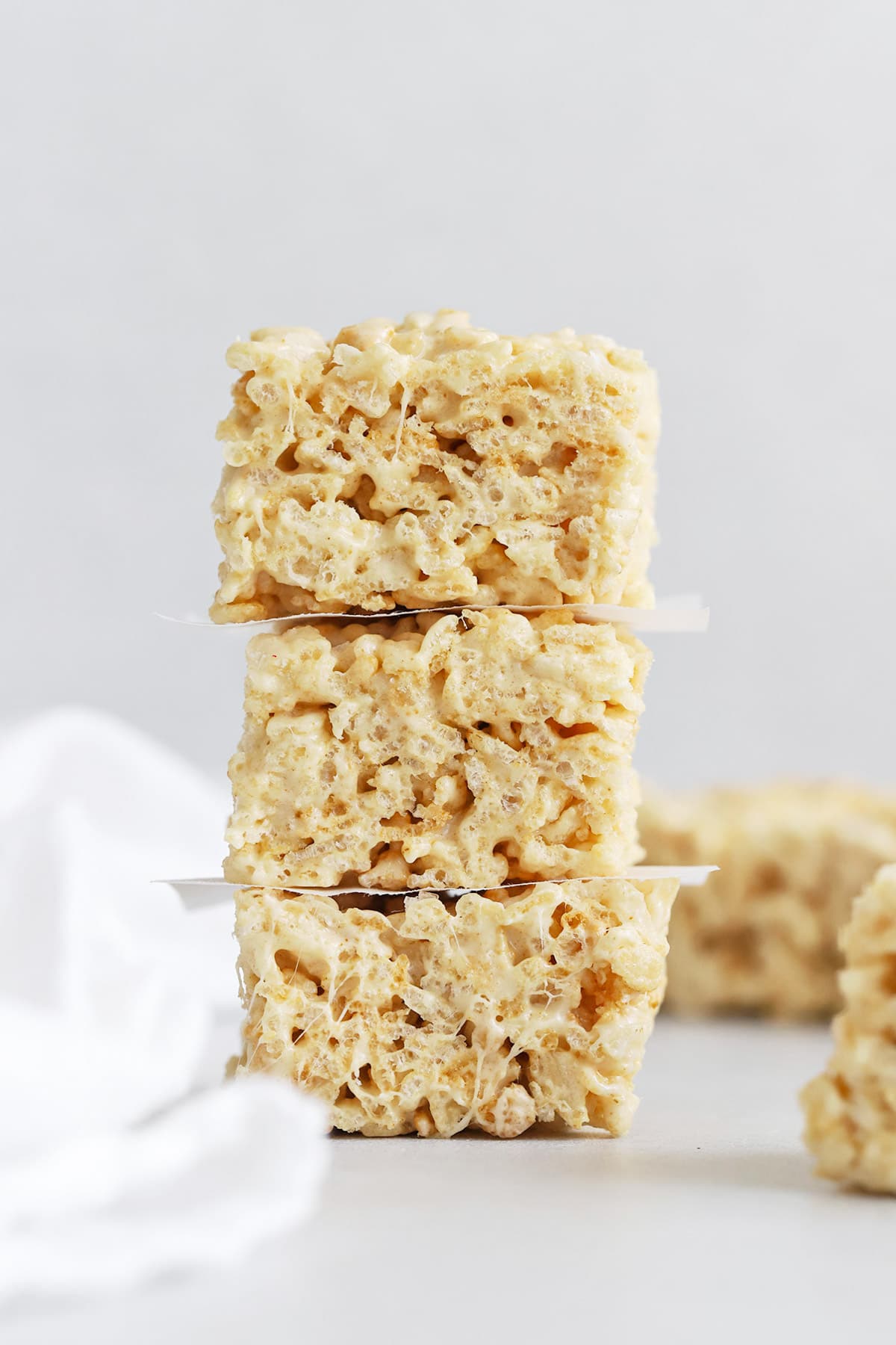 3 gluten-free brown butter rice krispies treats stacked on top of each other