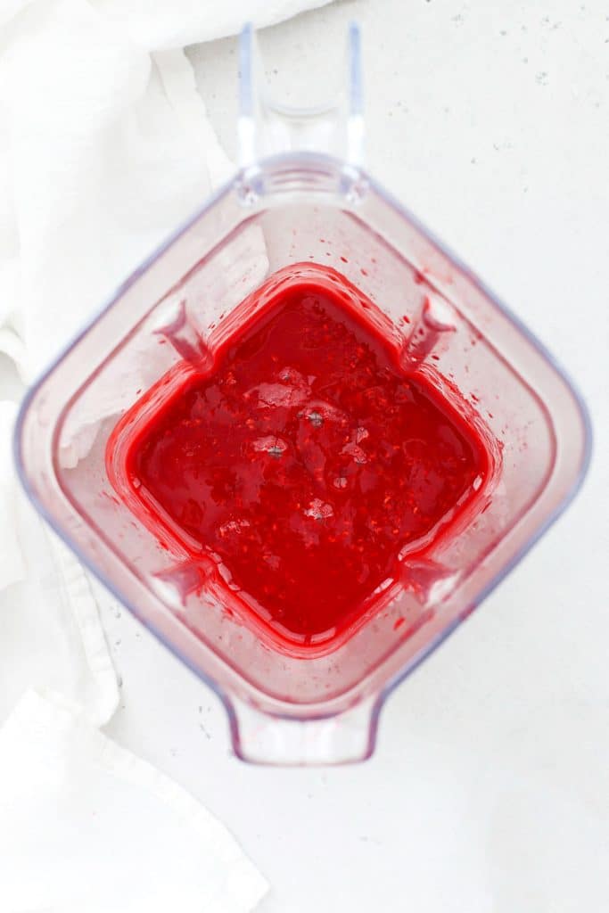 overhead view of freshly mixed raspberry coulis