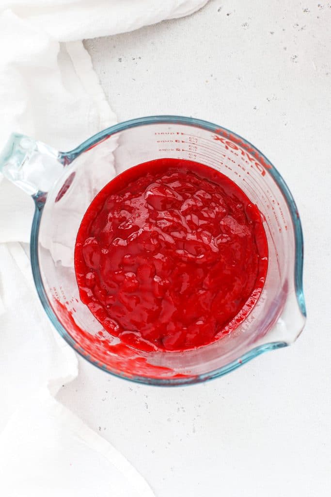 Overhead view of smooth raspberry coulis