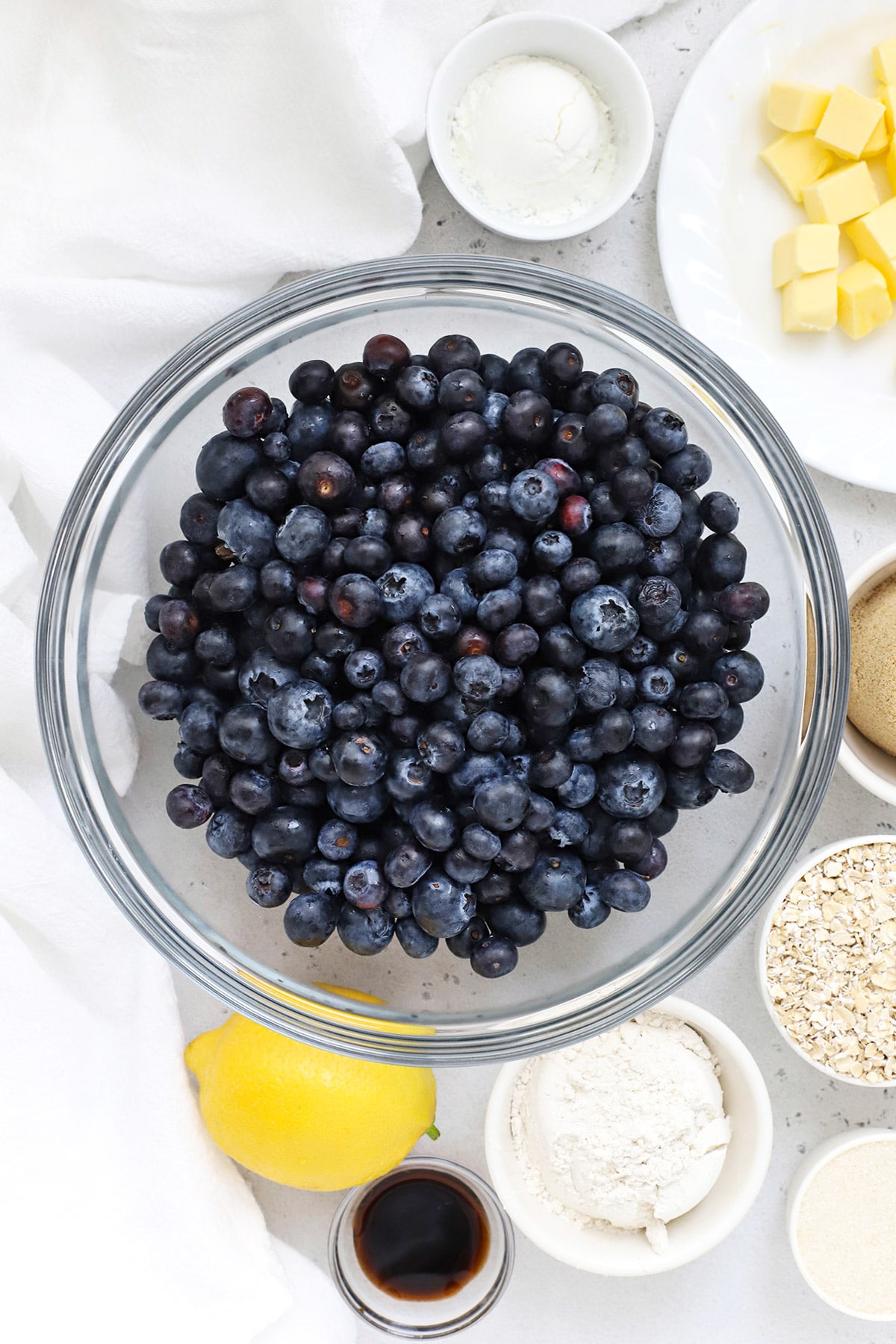 Overhead view of ingredients for gluten-free blueberry crisp