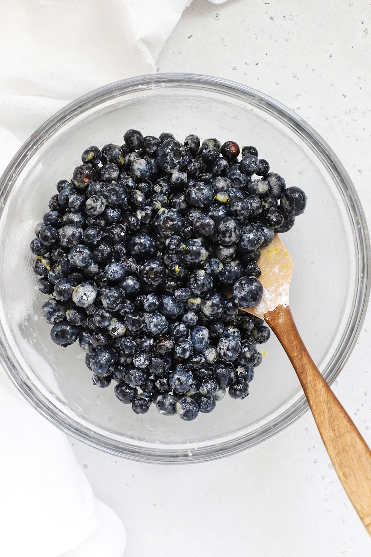 Mixing gluten-free blueberry crisp filling