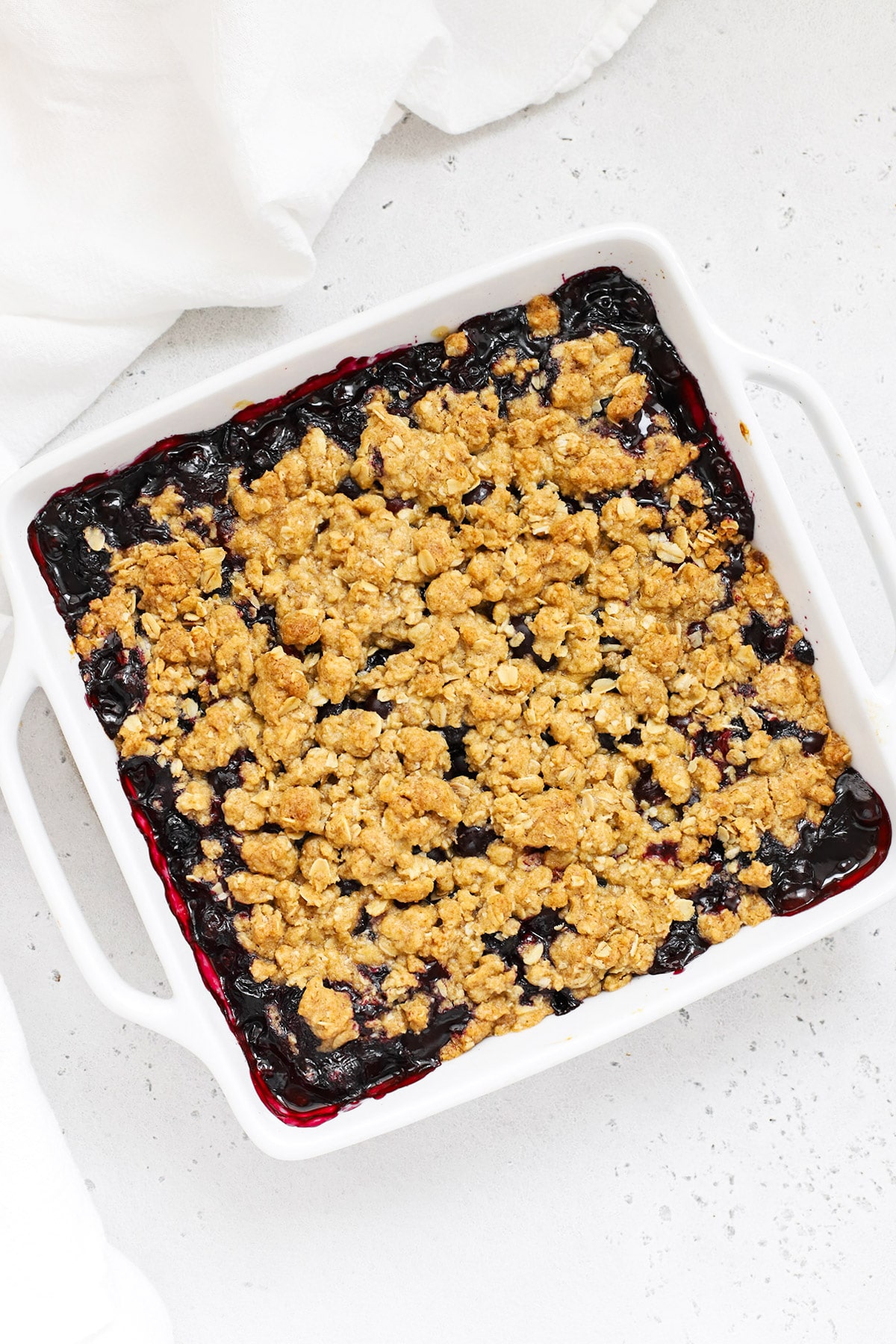 Overhead view of a pan of gluten-free blueberry crisp