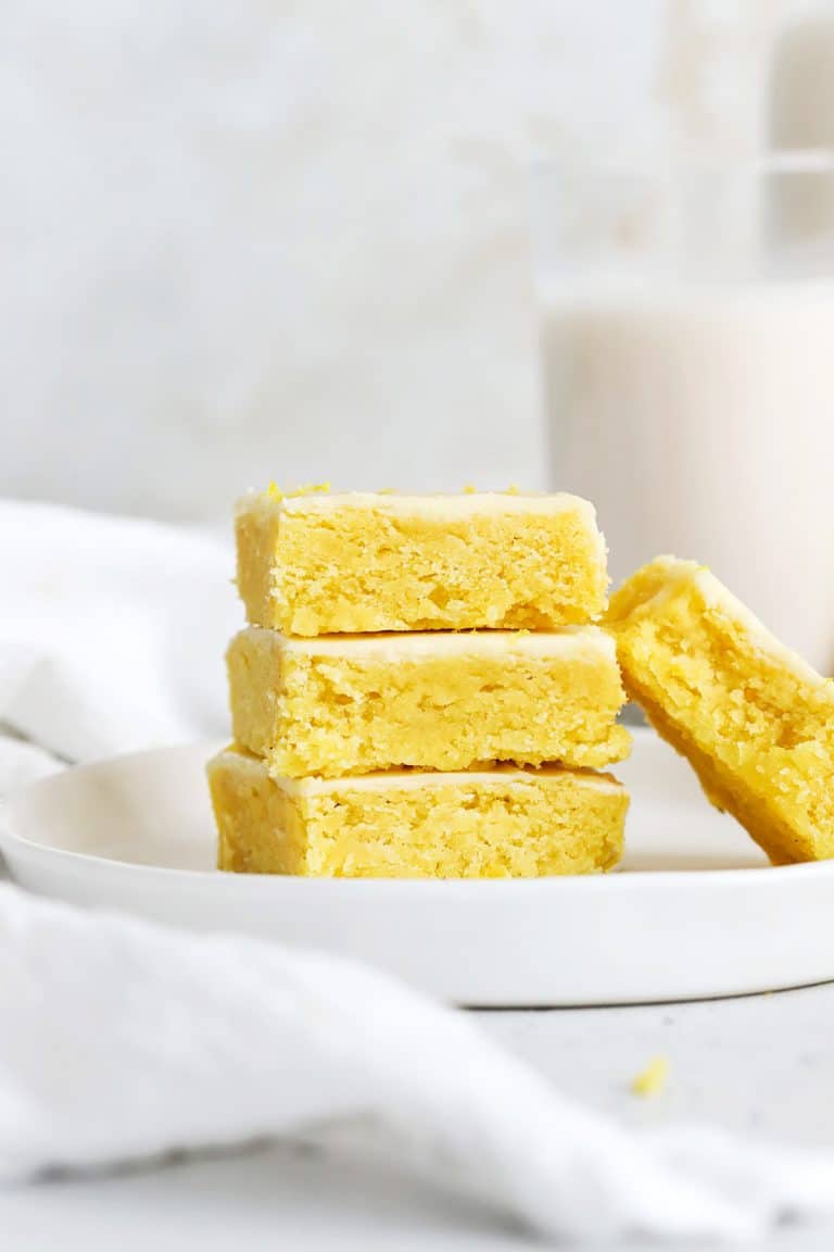 Front view of gluten-free lemon brownies stacked