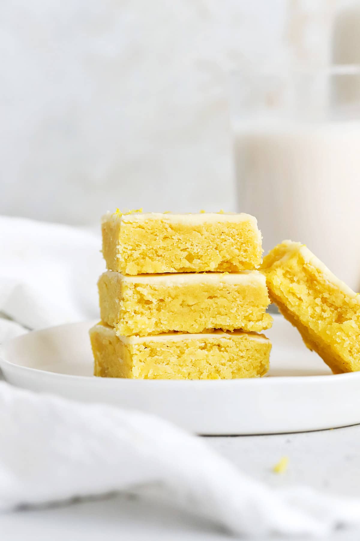 Front view of gluten-free lemon brownies stacked