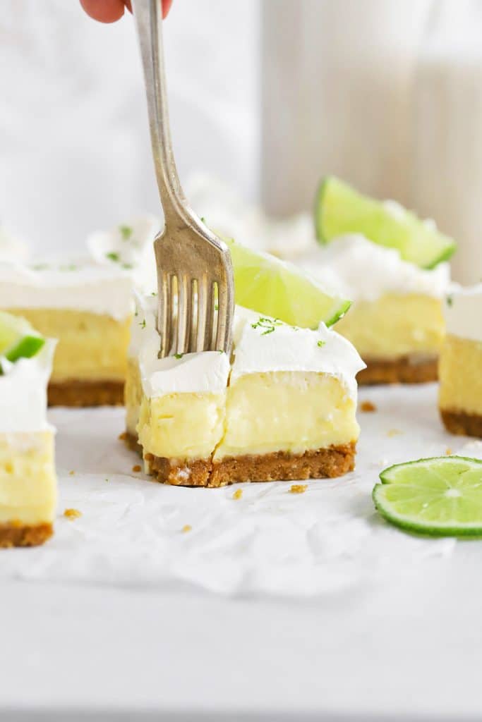 Front view of gluten-free key lime pie bars with graham cracker crust