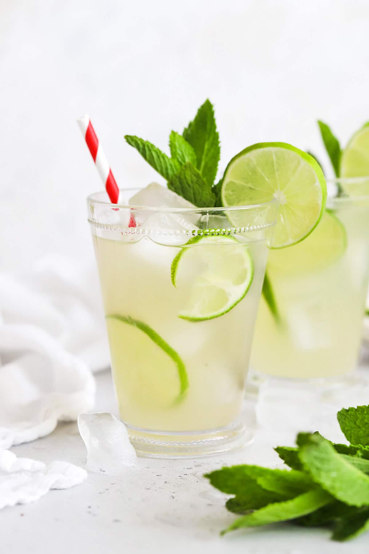 Front view of two glasses of virgin mojito mint limeade
