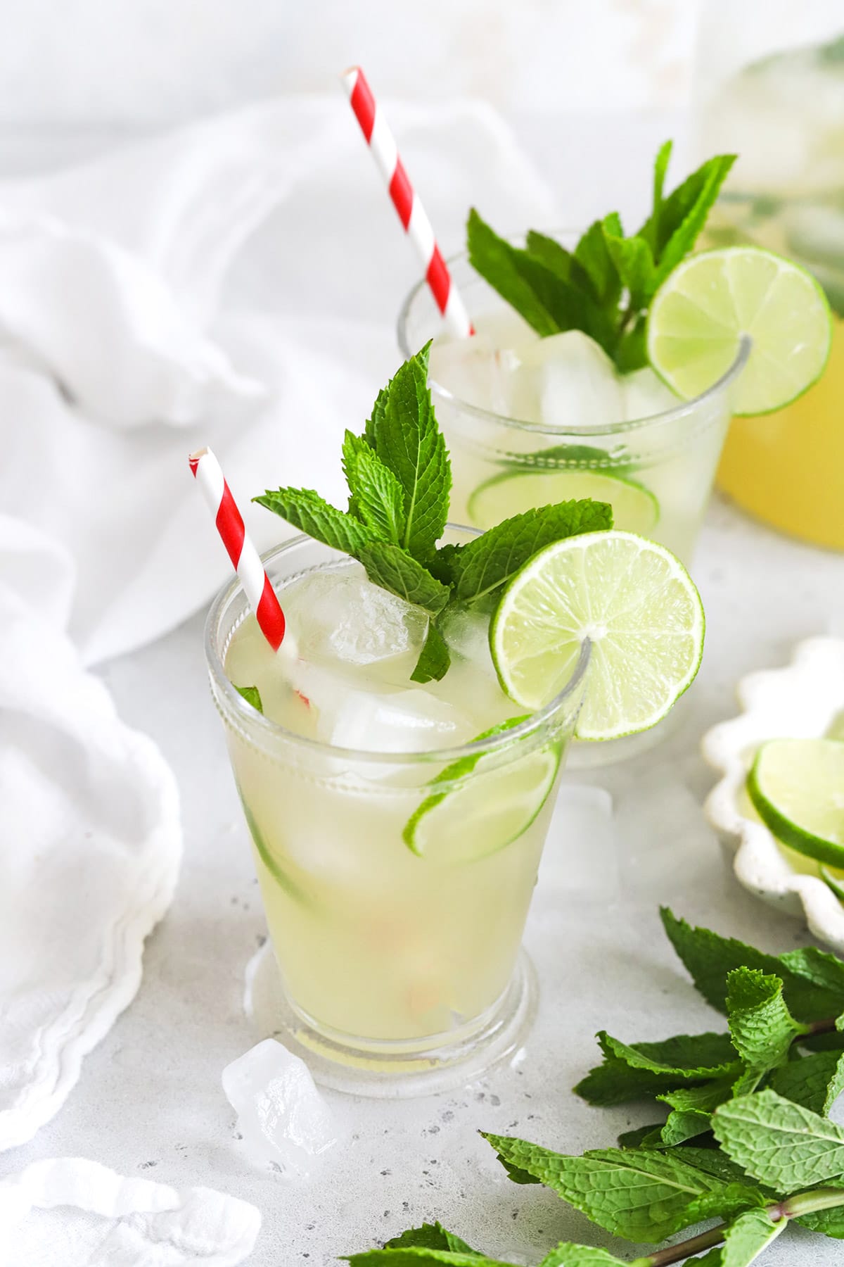 Front view of two glasses of virgin mojito mint limeade