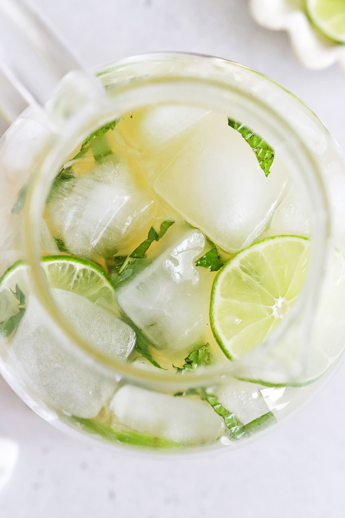 Overhead view of virgin mojito mint limeade garnished with fresh mint