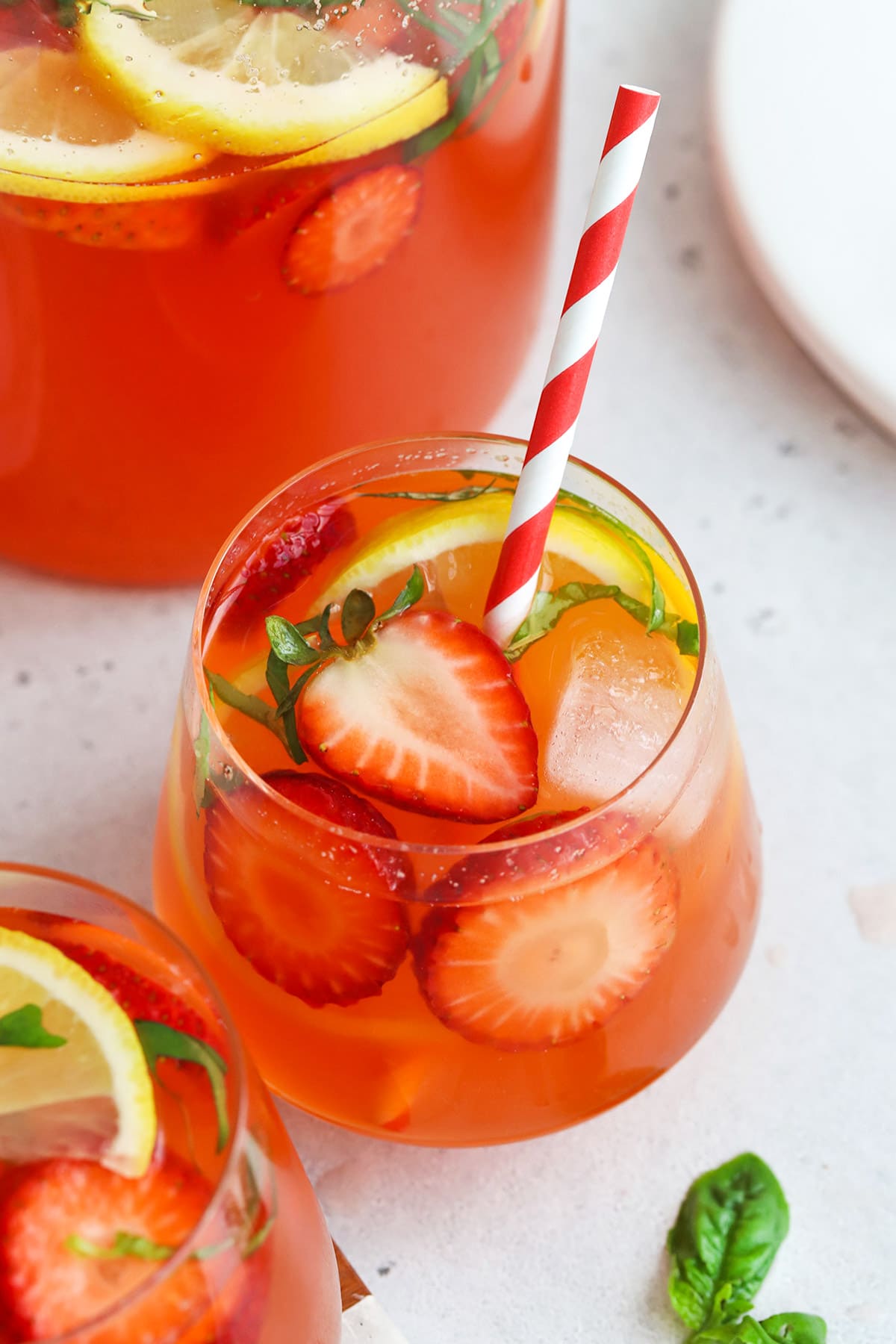 Overhead view of a glass of homemade strawberry basil lemonade