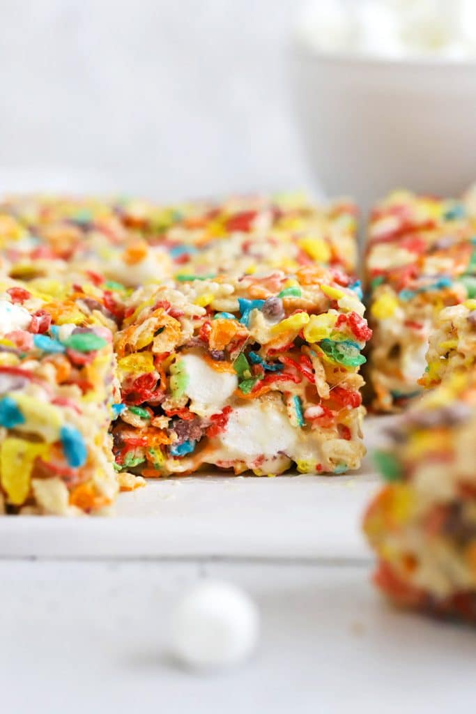 Front view of gluten-free fruity pebbles treats, cut into squares