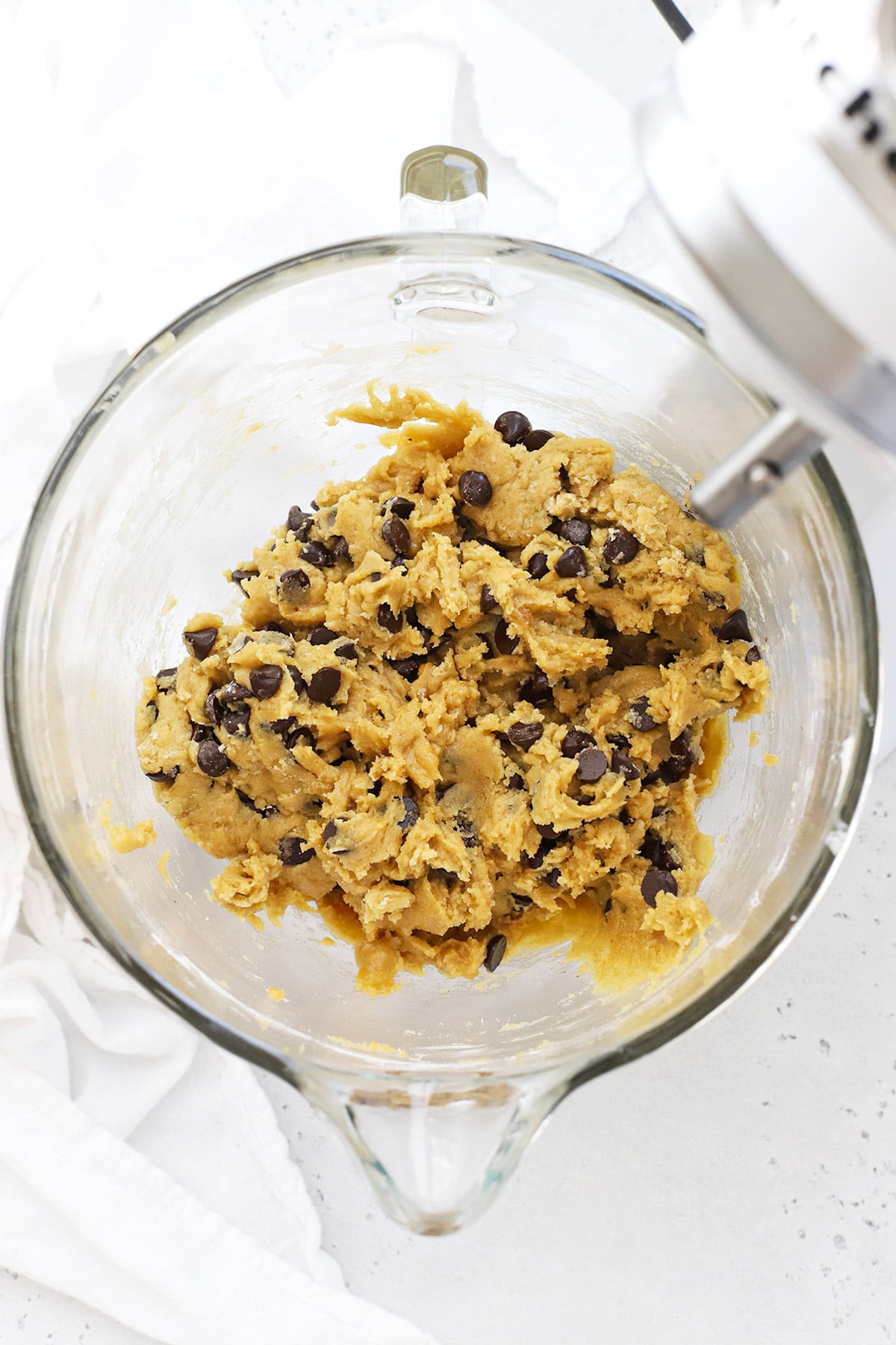 gluten-free Nutella stuffed chocolate chip cookie dough in a stand mixer