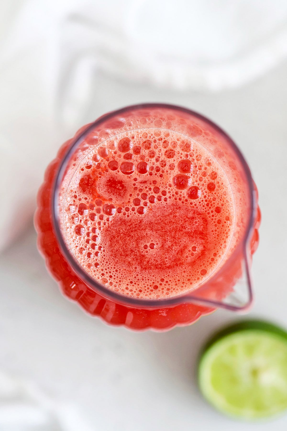 overhead view of a pitcher of watermelon agua fresca