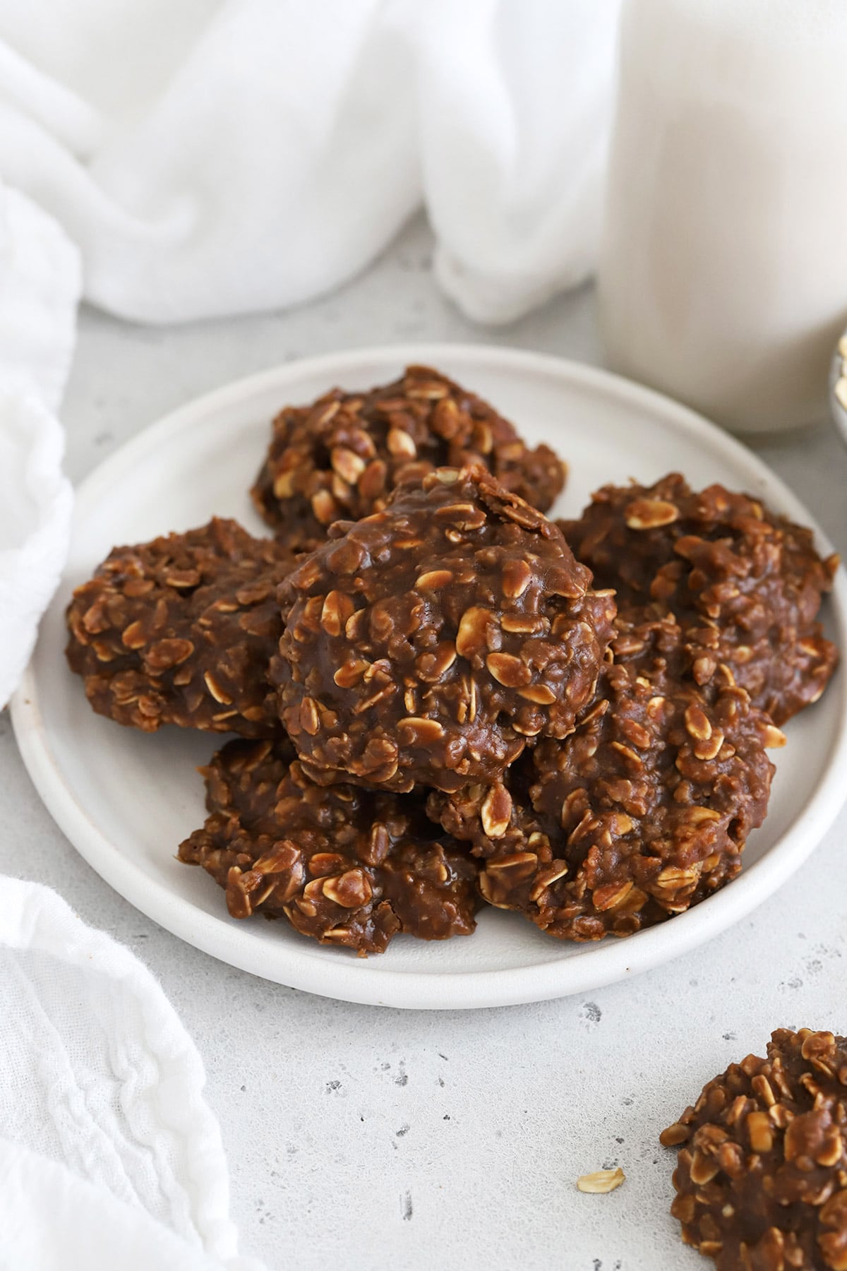 A plate full of gluten-free chocolate peanut butter no-bake cookies