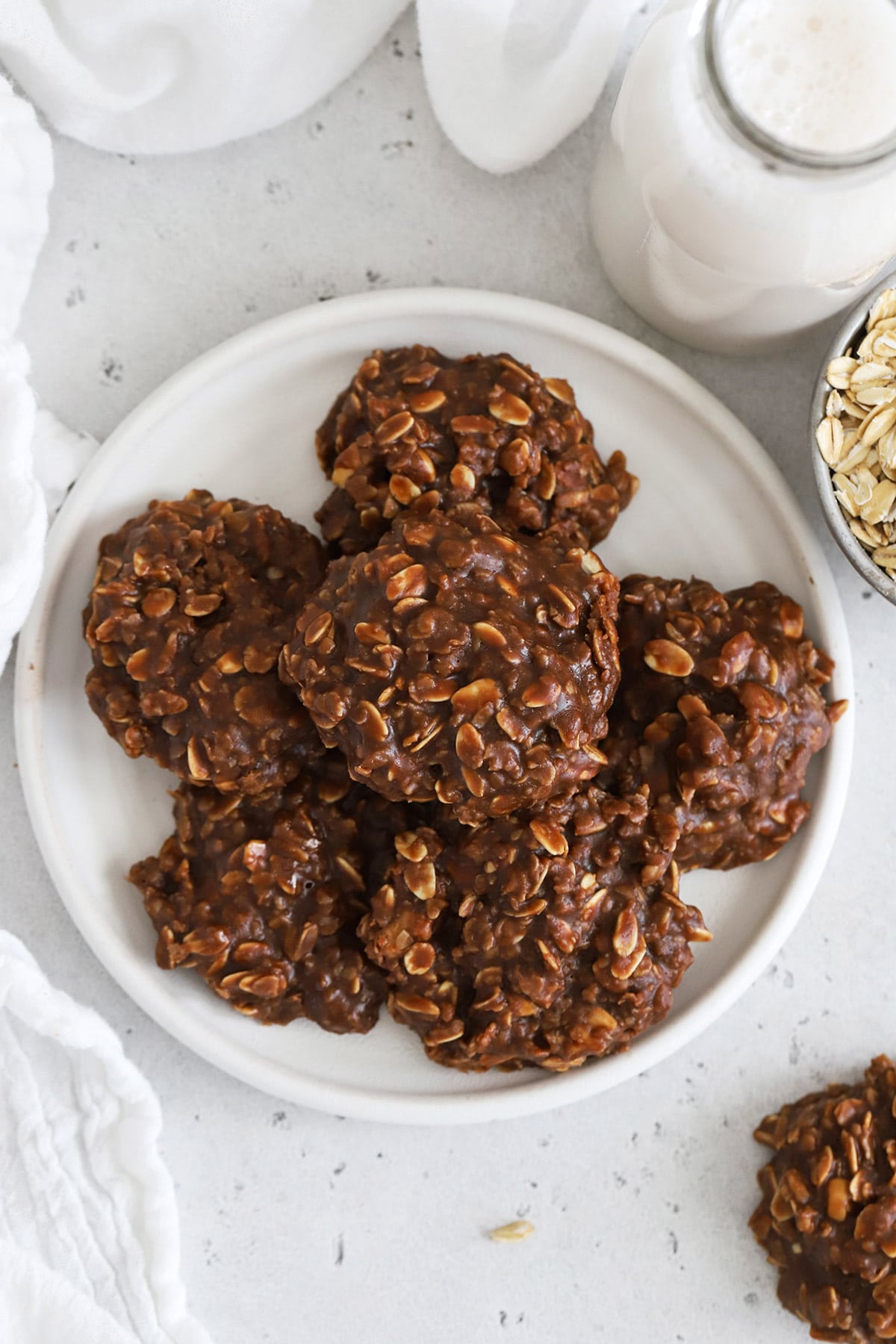 A plate full of gluten-free chocolate peanut butter no-bake cookies
