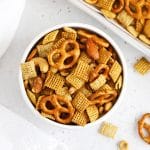 Overhead view of a bowl of easy gluten-free Chex Mix on a white background