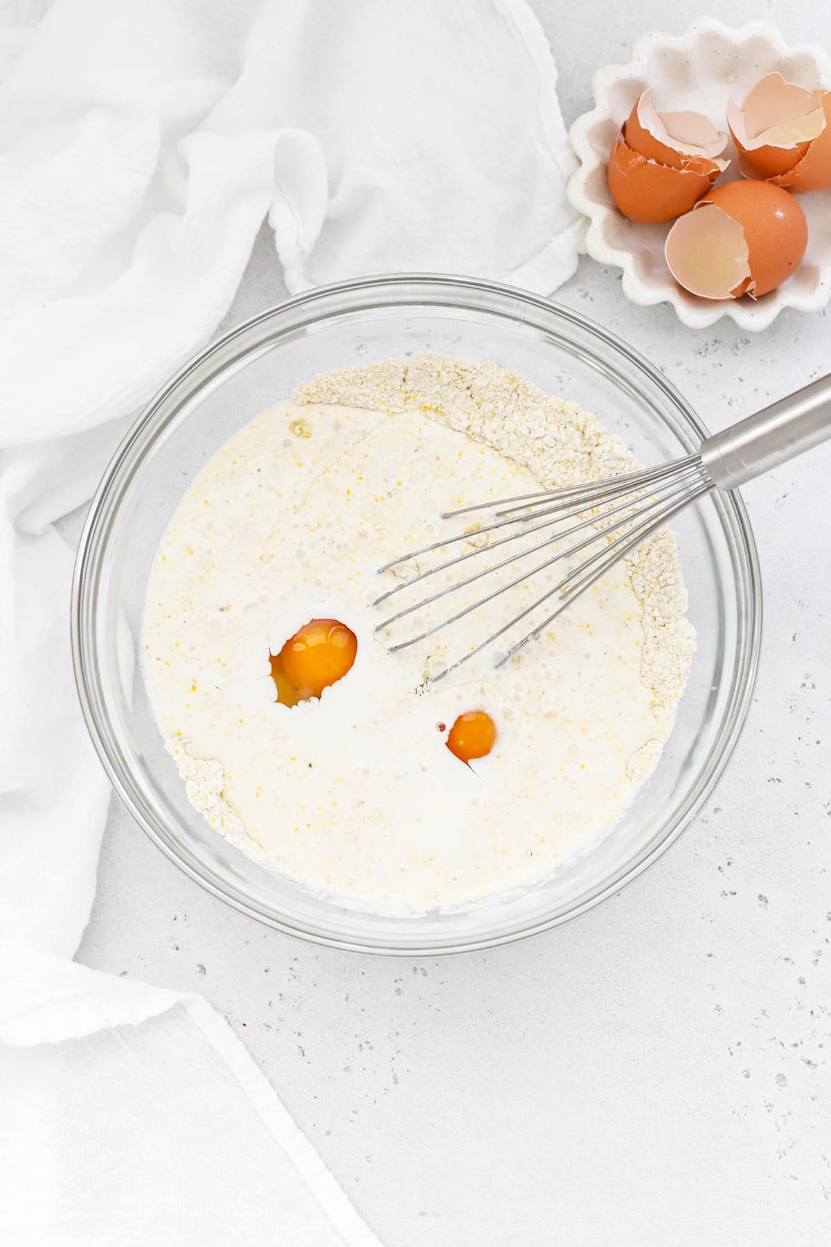 Adding eggs and milk to gluten-free cornbread batter