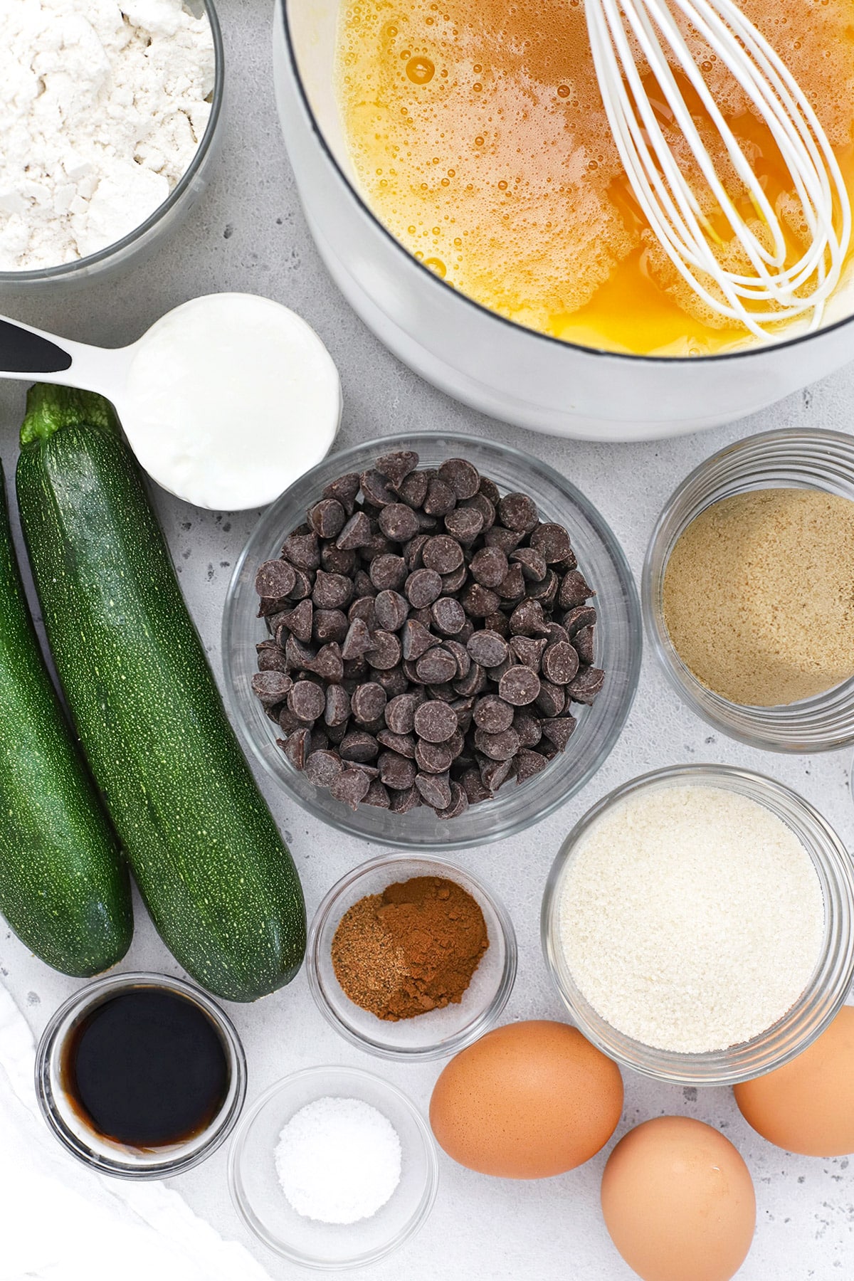 Overhead view of ingredients for gluten-free zucchini muffins