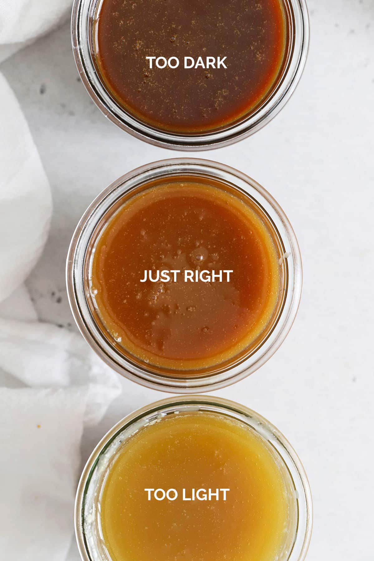 overhead view of three jars of caramel. One is too dark (burned), one is too light (underdone), and the one in the center is just right.