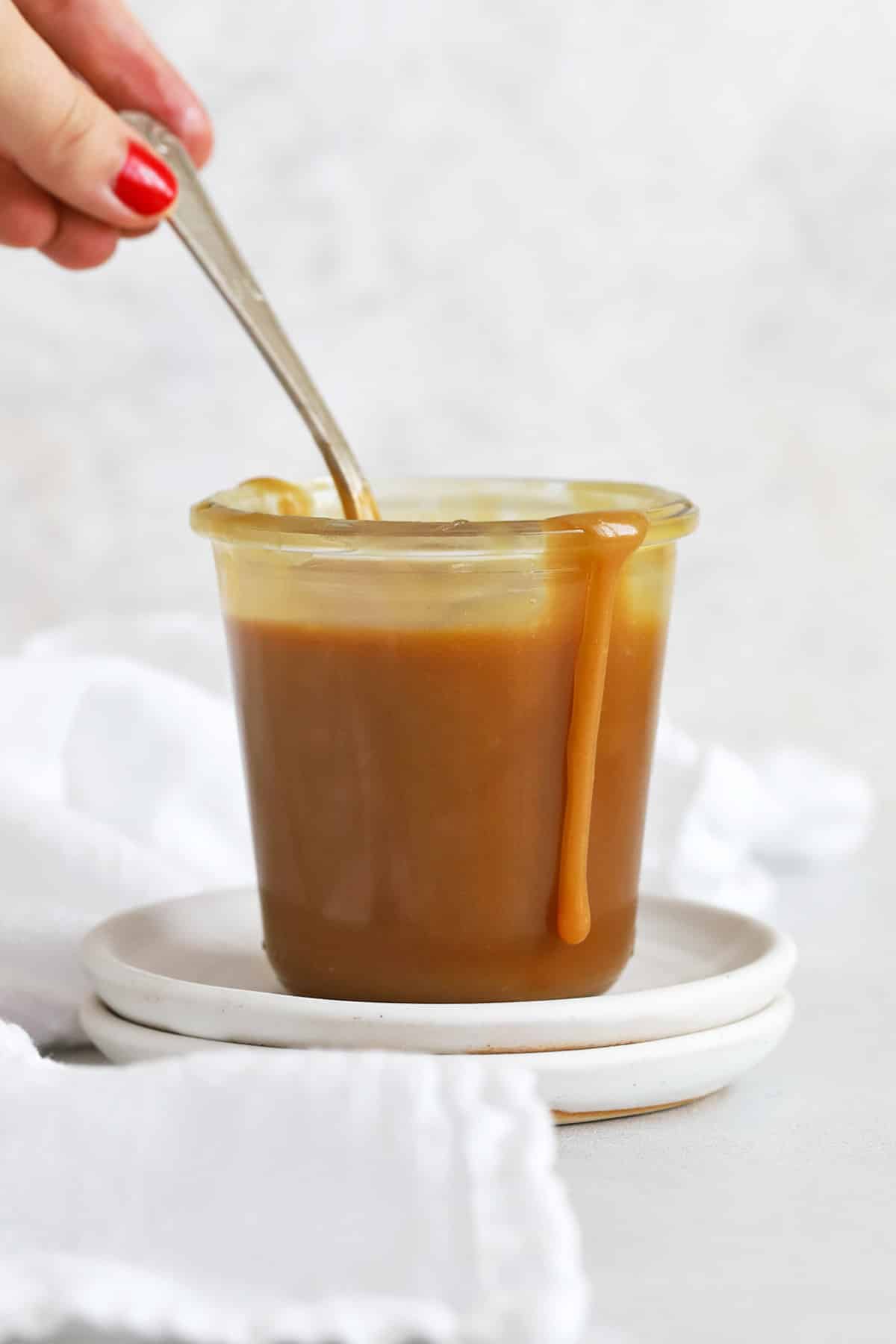 front view of a jar of easy caramel sauce