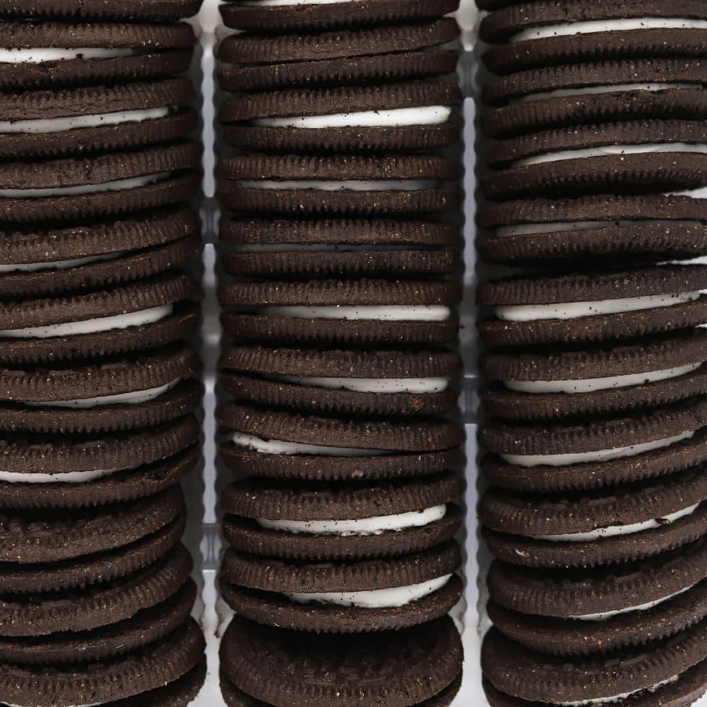 overhead view of gluten-free oreos in a package, arranged in neat lines
