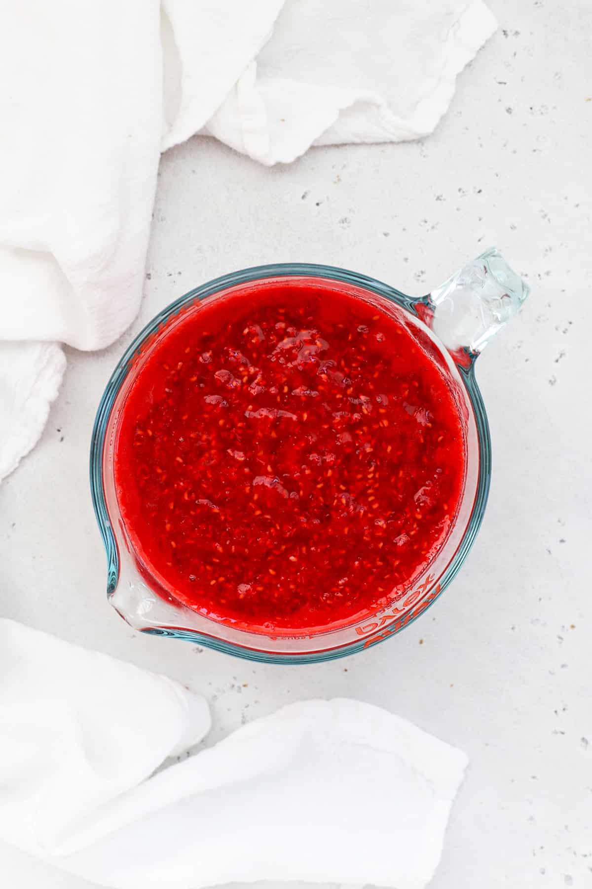 Mashed raspberries for homemade freezer jam