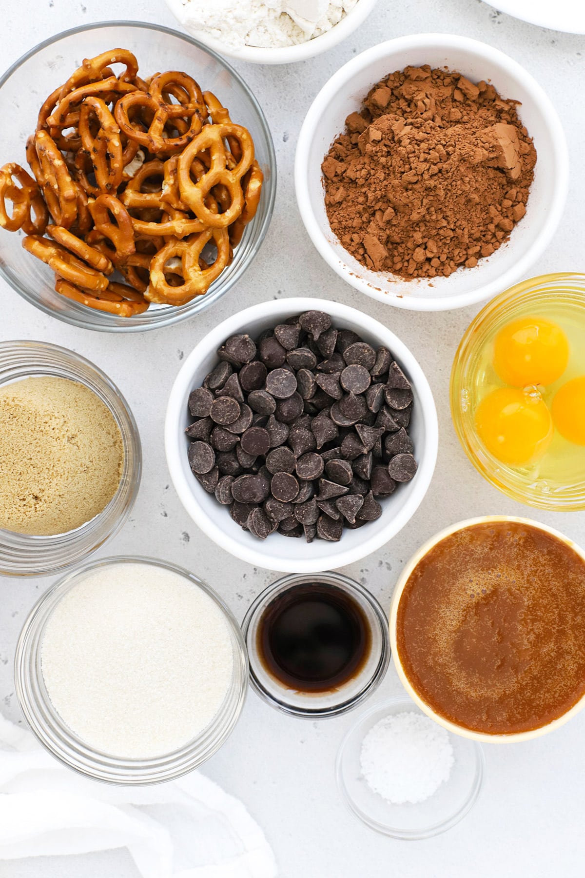 Overhead view of ingredients for gluten-free caramel pretzel brownies