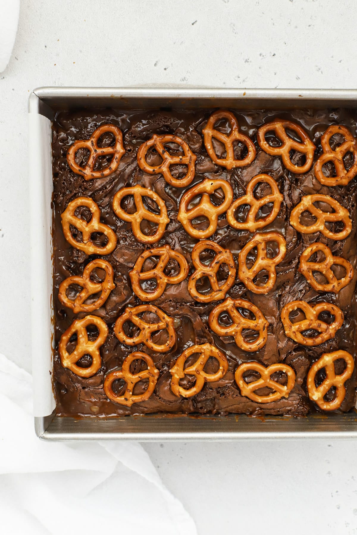 gluten-free caramel pretzel brownies before fresh from the oven