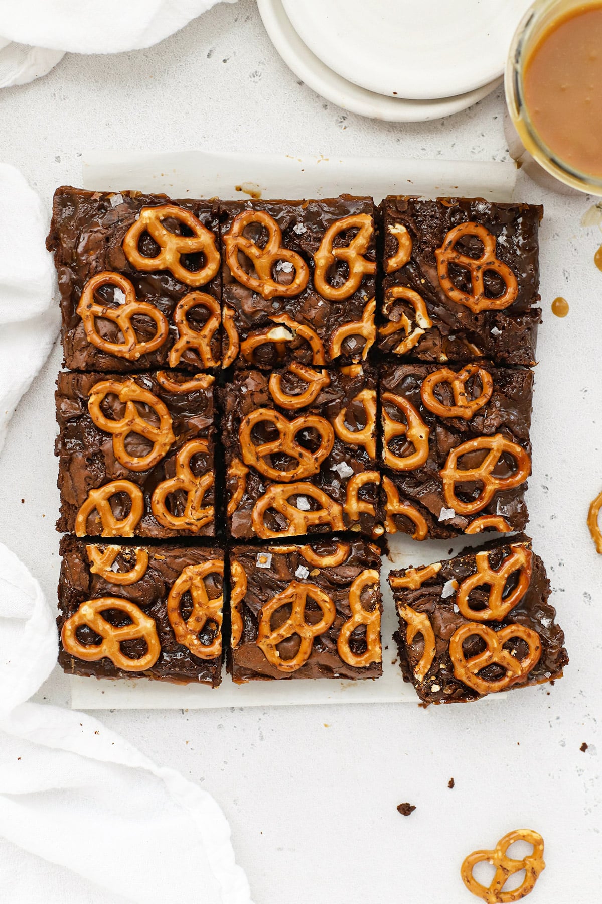 gluten-free caramel pretzel brownies cut into squares