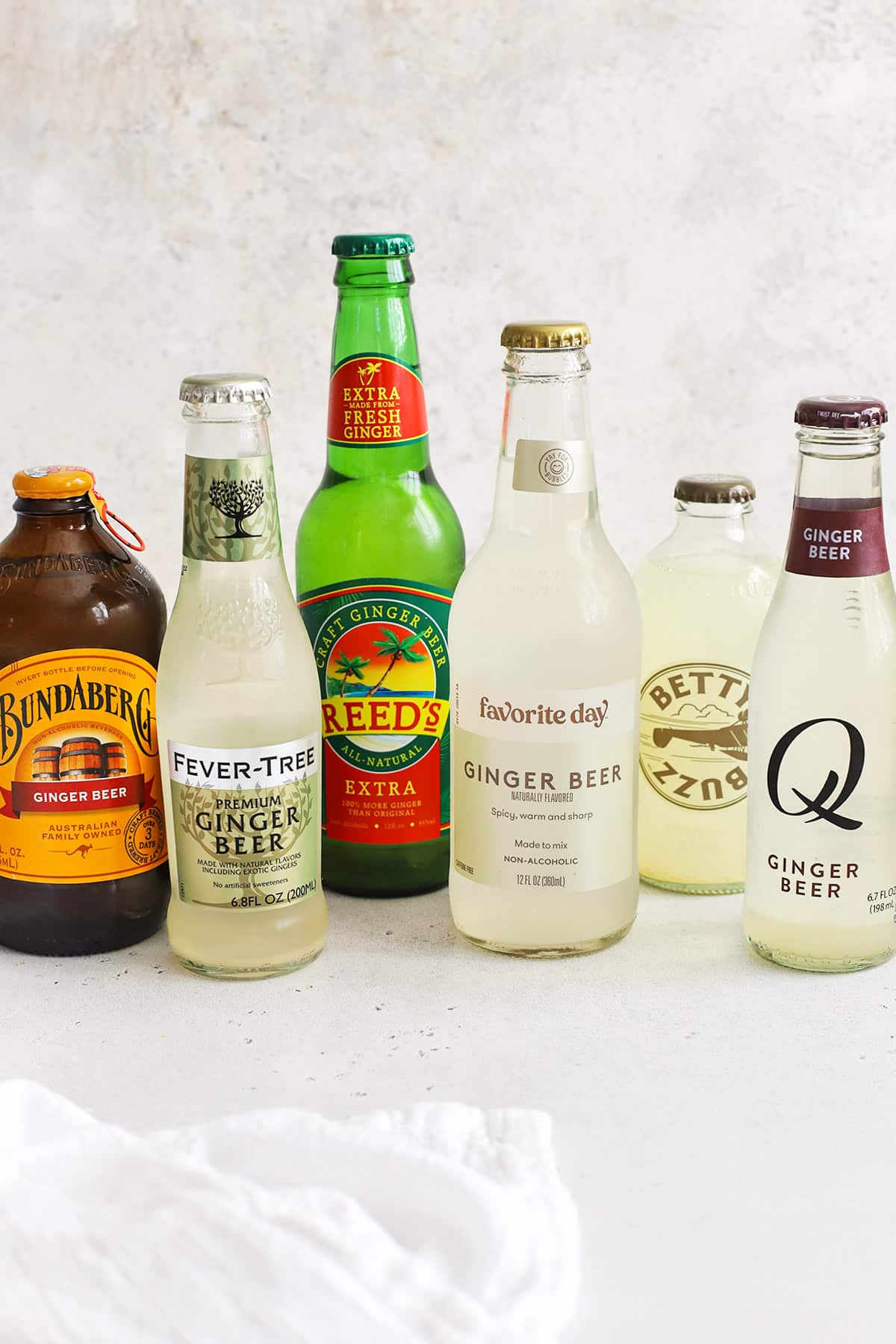 Front view of six brands of ginger beer