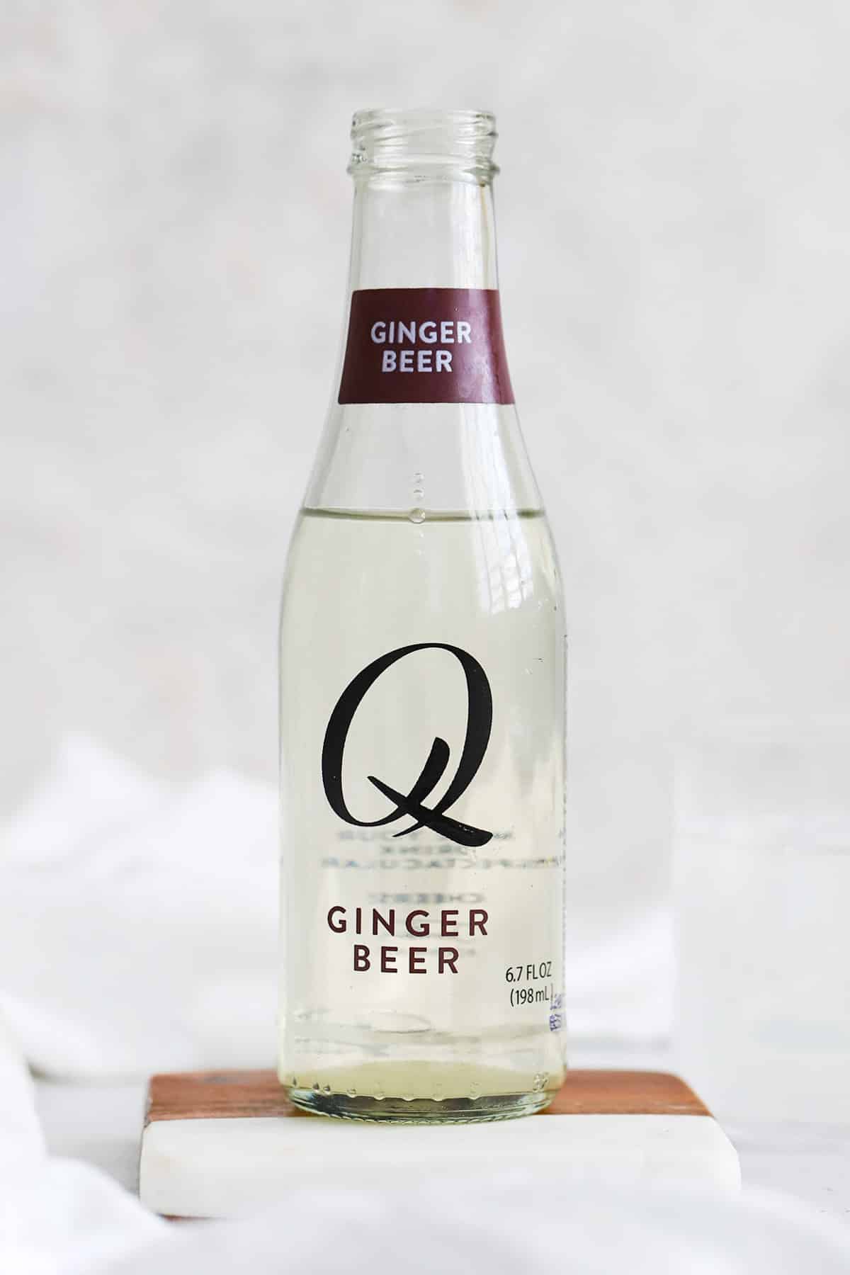 front view of a bottle of q mixers ginger beer