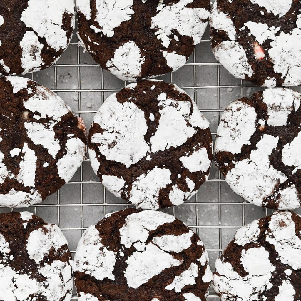 gluten free peppermint chocolate crinkles cookies on a wire racl