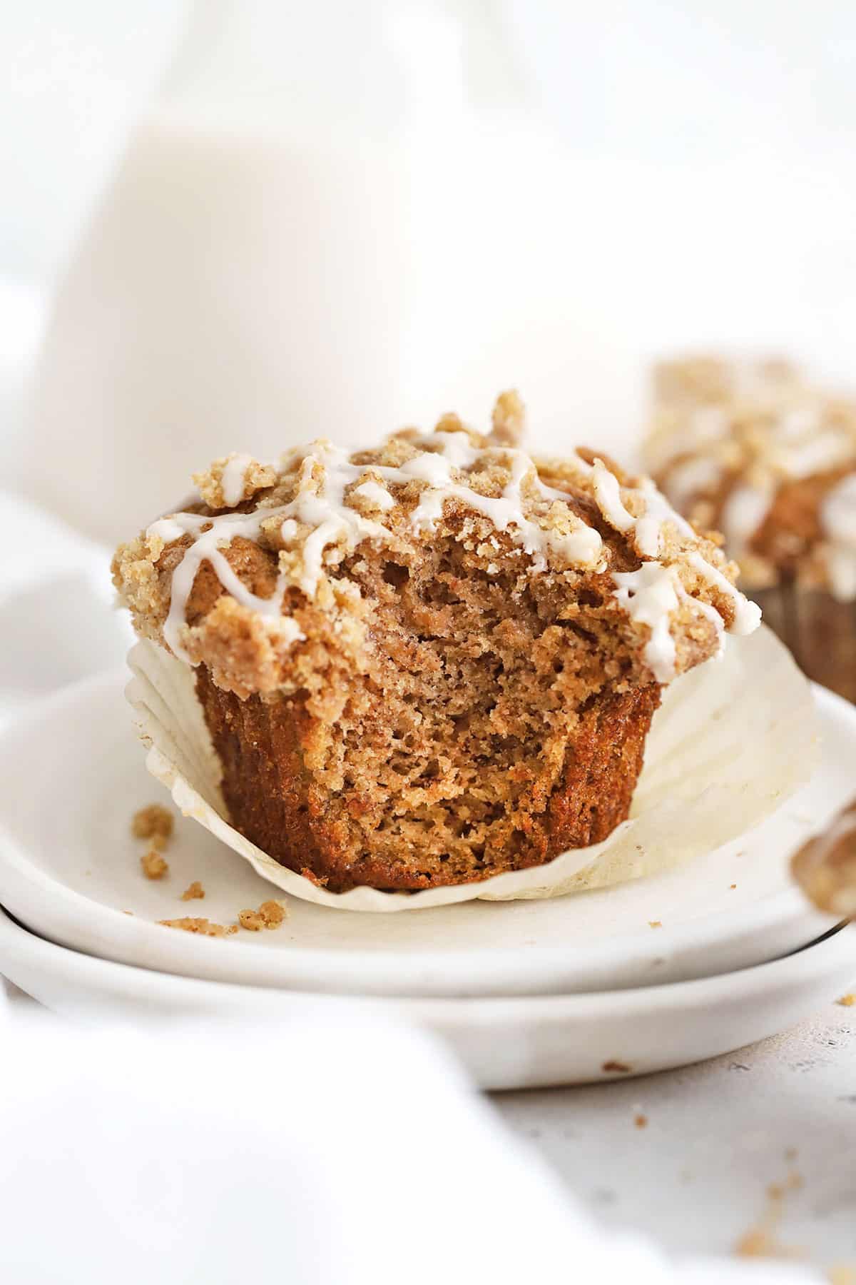 Gluten-Free Cinnamon Banana Crumb Muffins are your new brunch favorite. Fluffy gluten-free cinnamon banana muffins topped with cinnamon streusel topping. It's a double-dose of cinnamon goodness! // gluten-free banana streusel muffins / gluten-free banana muffins with streusel topping / gluten-free banana muffins with crumb topping / gluten-free cinnamon banana muffins recipe / gluten-free banana coffee cake muffins / gluten-free banana muffins recipe / gluten-free muffins