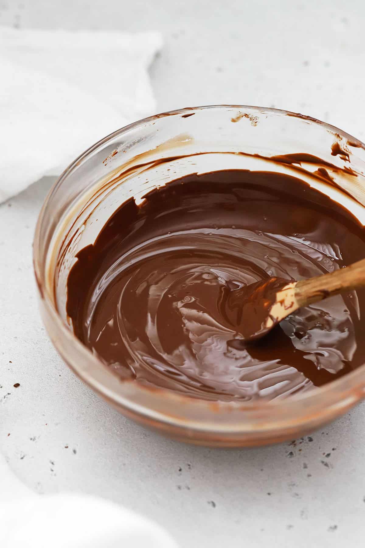 Tempered chocolate in a glass bowl