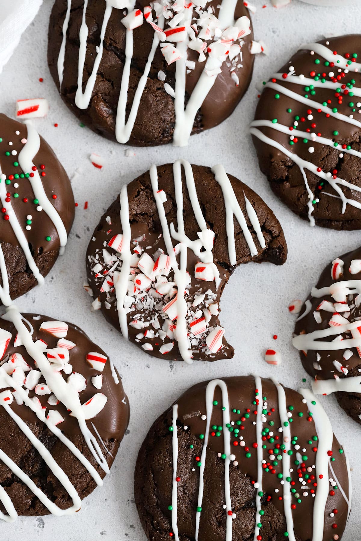 Gluten-free chocolate candy cane cookies on a white background